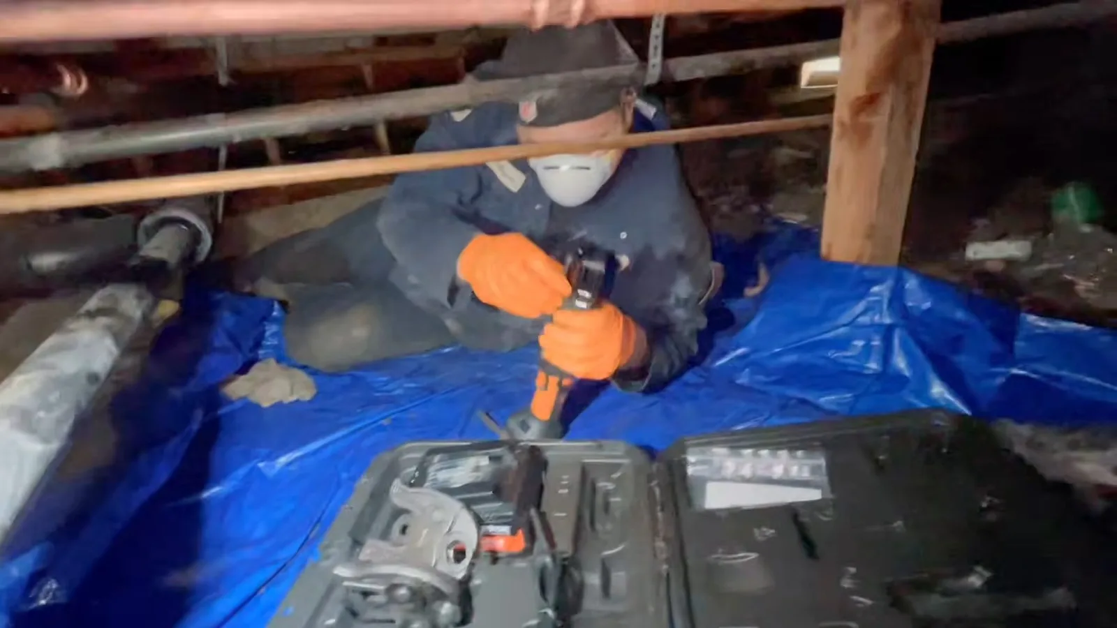 Insulation and ductwork sharing a crawl space with the plumbing, illustrating index.html