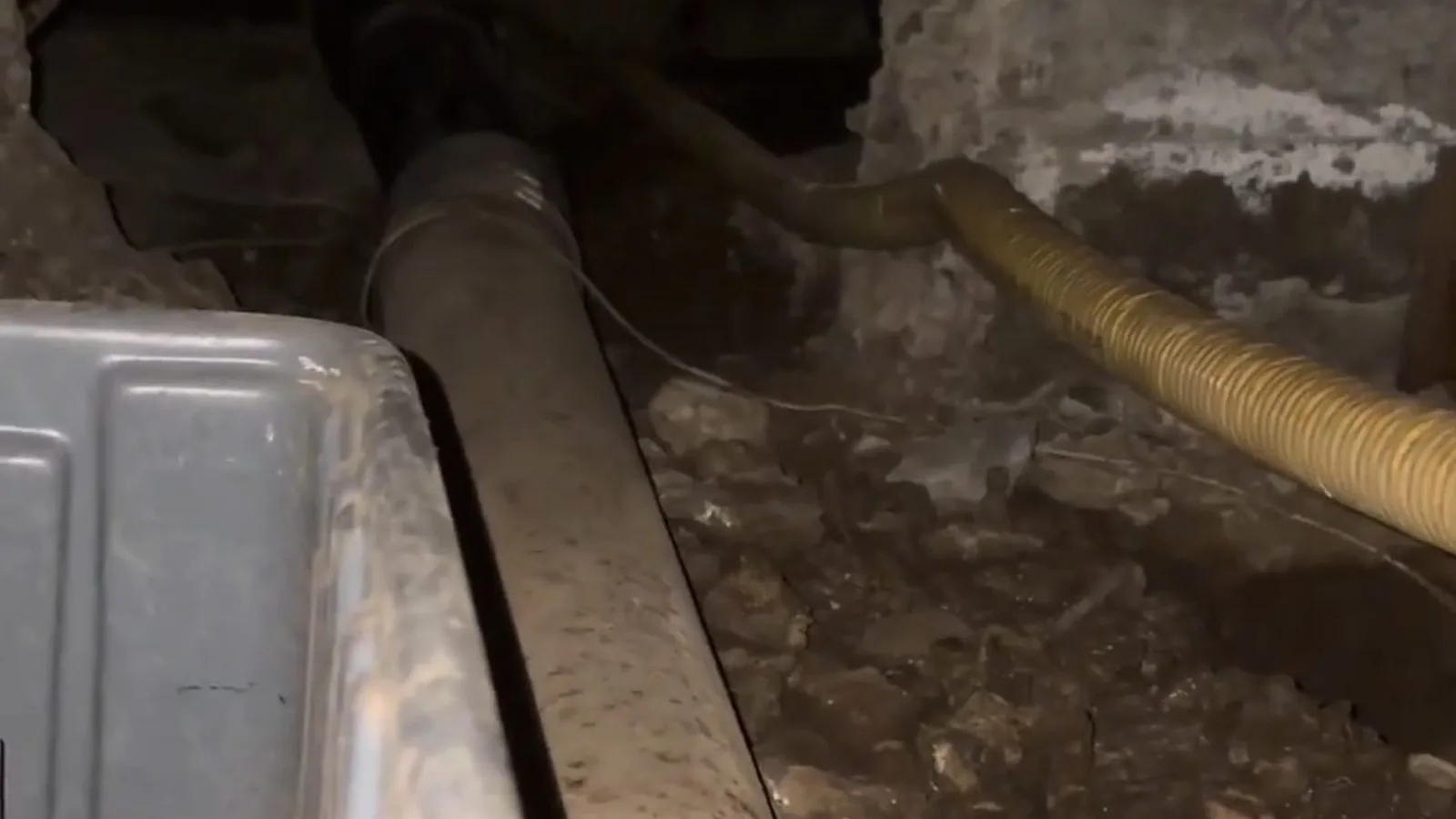 A plumbing line inspected inside a crawl space on a plumbing call in Duluth, GA
