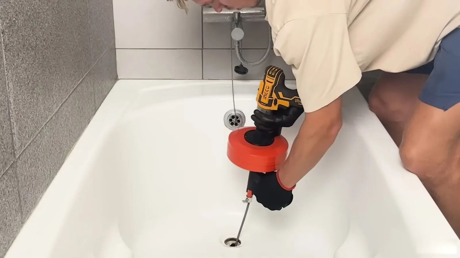 A pipe wrench and fittings staged for a repair, related to Pinhole Leaks in Alpharetta Copper Pipes: Why 1980s–90s Homes Are Failing Now