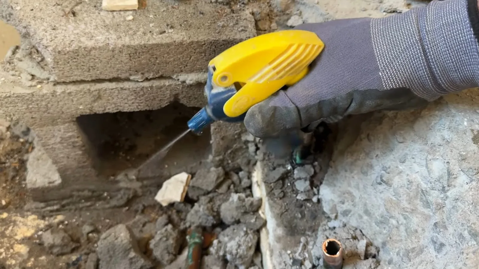 A leak detection listening device placed against a pipe for Leak Detection in Alpharetta, GA