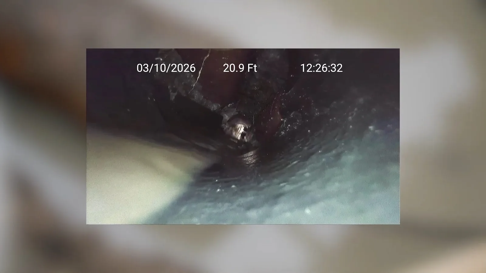 A cleanout plug stuck in an aging cast iron fitting during a service visit in North Park