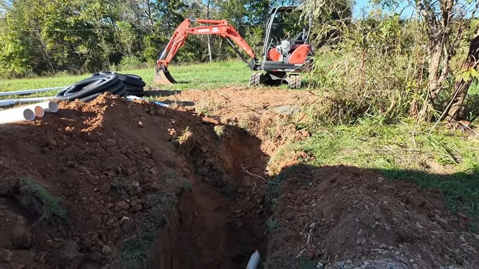 An old cast iron sewer section removed during a full replacement for Sewer Line Replacement in Alpharetta, GA