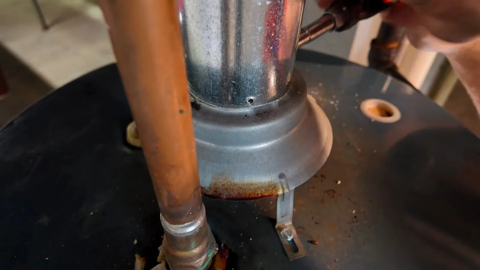 A new gas water heater being set in place during a service visit in Sugar Hill, GA