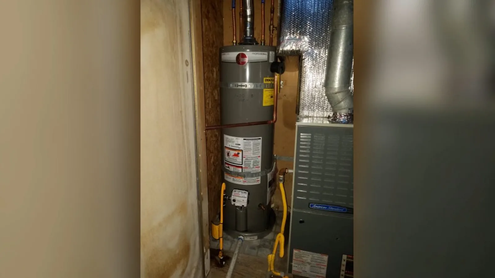 A water heater's pressure relief valve being tested during Water Heater Repair service in Alpharetta